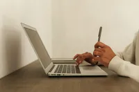 kaboompics_remote-work-and-home-office-with-laptop-phone-and-camera-39021