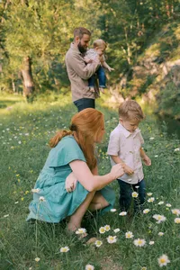 black hills family picking wildflowers