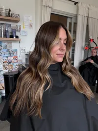 Cool toned brunette Balayage with lived in roots for low maintenance.