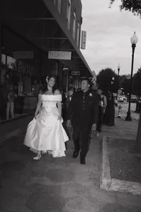 Bride and Groom walking in downtown Covington, Georgia.