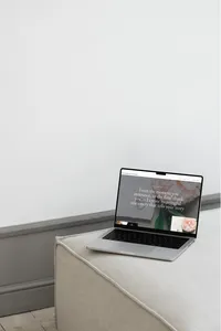 Services page of Showit website template for wedding stationery designers shown on laptop.