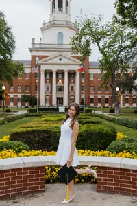 An evening session on the Baylor campus with a girl in a white dress