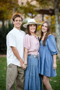Mother and kids embracing during a family photography session in Orange County