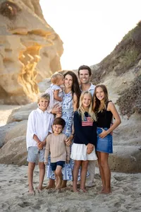 Big family during a family photo session in a beach in Orange County