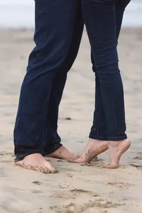 Close up during an engagement photography session by Lauren Ford Photography in Orange County beach