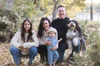 Family and dog during a winter family photo session in Orange County