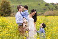 family looking at each other during a spring family photo session in Orange County