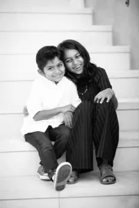 Siblings laughing during a family photography session in Orange County