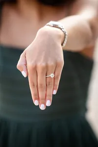 Engagement ring close up at an engagement photography session at the beach by Lauren Ford Photography in Orange County