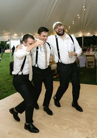 Groom and friends dancing