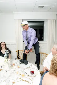 Guest dancing on top of chair