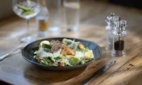 Freshly prepared Caesar salad served at the Fox & Hounds Country Hotel in Devon.