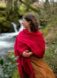 Wellbeing practitioner Virginia Compton beside the River Dart in Devon, photographed by Simon Moore.