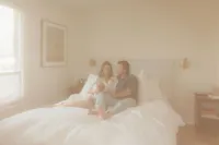 parents-bed-newborn-dreamy-light-modern-bedroom-boulder-in-home-session-41