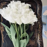 White Noordeinde Tulips with elegant fringed petals in full bloom