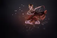 Dancer in a red costume suspended mid-leap against a dark background scattered with points of light.