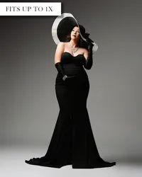 Black maternity gown with a strapless sweetheart neckline, fitted silhouette, and a flared skirt with a short train.
