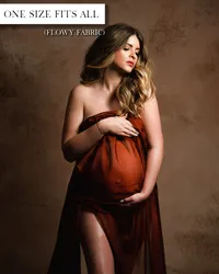 Burnt orange maternity gown with a strapless neckline, gathered fabric over the belly, and a flowing train.