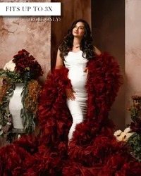 Burgundy maternity robe with an open front, oversized ruffled sleeves, and a long train covered in ruffles.