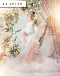 Pale pink sheer maternity robe with ruffled trim and a long train, worn over a fitted white dress.