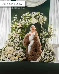 Neutral tan maternity robe with ruffled trim and a long train, worn over a fitted white dress.