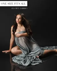 Slate gray maternity gown with a strapless neckline, loose gathered fabric, open front, and softly pooled train.