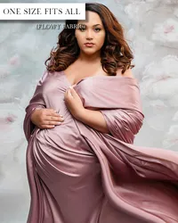 Dusty rose maternity gown with an off-the-shoulder draped neckline, gathered sleeves, and flowing fabric.