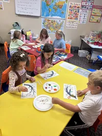 kids painting during art class