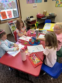 kids drawing during art class