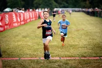 running crossing the finish line
