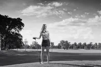 Senior Picture Photographer Captures Athletic High School Portrait on Golf Course-08