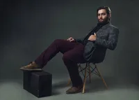 Studio portrait with cinematic backlight and minimal styling