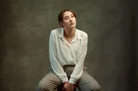 Studio portrait with bold angles and editorial fashion posing