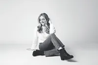 Dramatic editorial portrait with high-contrast studio lighting