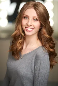 Senior girl photographed with gel lighting for a creative studio effect