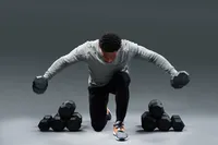 Athletic professional branding portrait with dynamic pose and editorial lighting in Minneapolis