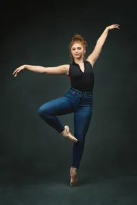 Ballet senior pictures with graceful pose and expressive movement by Minneapolis photographer