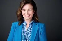 Professional business headshot with clean studio lighting and confident expression in Minneapolis