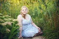 senior girl outdoor portrait in blooming flower field Minnesota