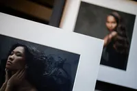 Studio display showing fine art portrait products
