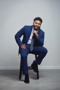 Business branding portrait for entrepreneur in Minneapolis with authentic expression and intentional wardrobe