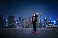 Senior Picture captures Urban Senior Portrait with City Skyline