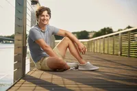 high school senior boy portrait near Mississippi River St Paul