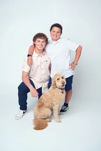 Happy Siblings and Dog Posing for Family Portrait in Minnesota-40