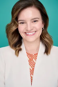 Smiling business woman headshot photographed in Minneapolis St Paul studio