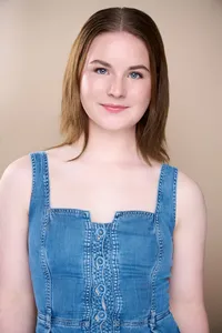 Commercial actor headshot photographed in studio with natural expression