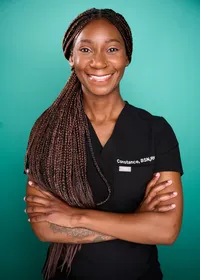 12:46 PM
Professional headshot for healthcare worker with warm approachable expression in Minneapolis studio