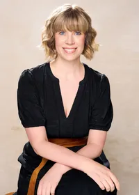 Confident executive portrait captured with professional lighting in St Paul photography studio