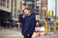 High school senior photographed in a Minneapolis skyway with dramatic architectural lines by Megan Engeseth Photography