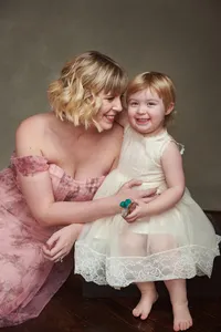 Creative editorial fine art portrait of family with mom and daughter photographed in Minneapolis St Paul studio